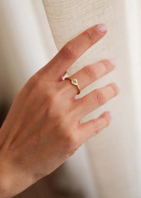 Stellar Ring — gold ring with starburst detail on model — MYFASHIONFRUIT