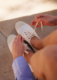 Lavanda Sneakers — White canvas tie-up sneakers on model — MYFASHIONFRUIT