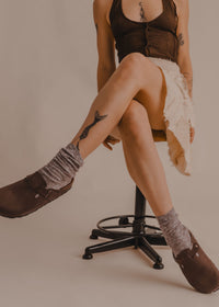 Bilbao Suede Clogs — Brown suede clogs, grey socks, on model — MYFASHIONFRUIT