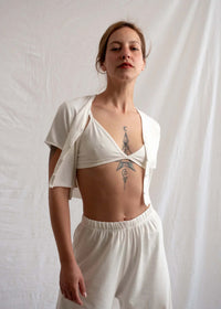 Woman wearing a white Yang Cardi, bra top and wide leg pants set — MYFASHIONFRUIT