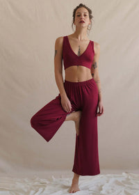 Woman wearing Tender Pants — burgundy wide-leg soft-touch pants and matching crop top — MYFASHIONFRUIT