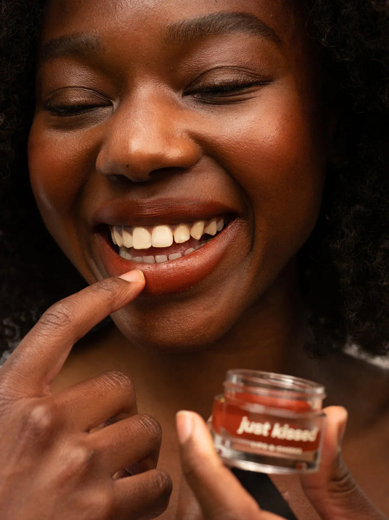 Just Kissed — Model applying product on lips, detail — MYFASHIONFRUIT