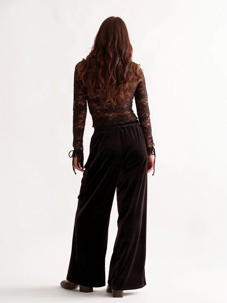 Morena Pants — Black velvet wide-leg on model, back view — MYFASHIONFRUIT