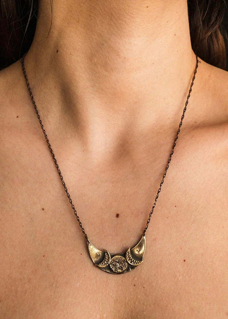 Eclipse Necklace — gold lunar pendant on model — MYFASHIONFRUIT