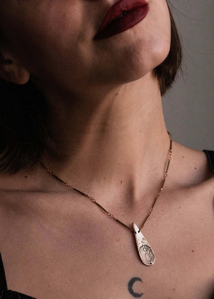 Kaira Pendant — Silver pendant on model, detail — MYFASHIONFRUIT