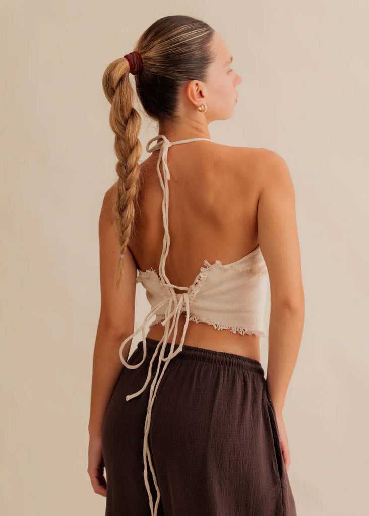 Amaya Top — Cream halter top with tie back, on model — MYFASHIONFRUIT