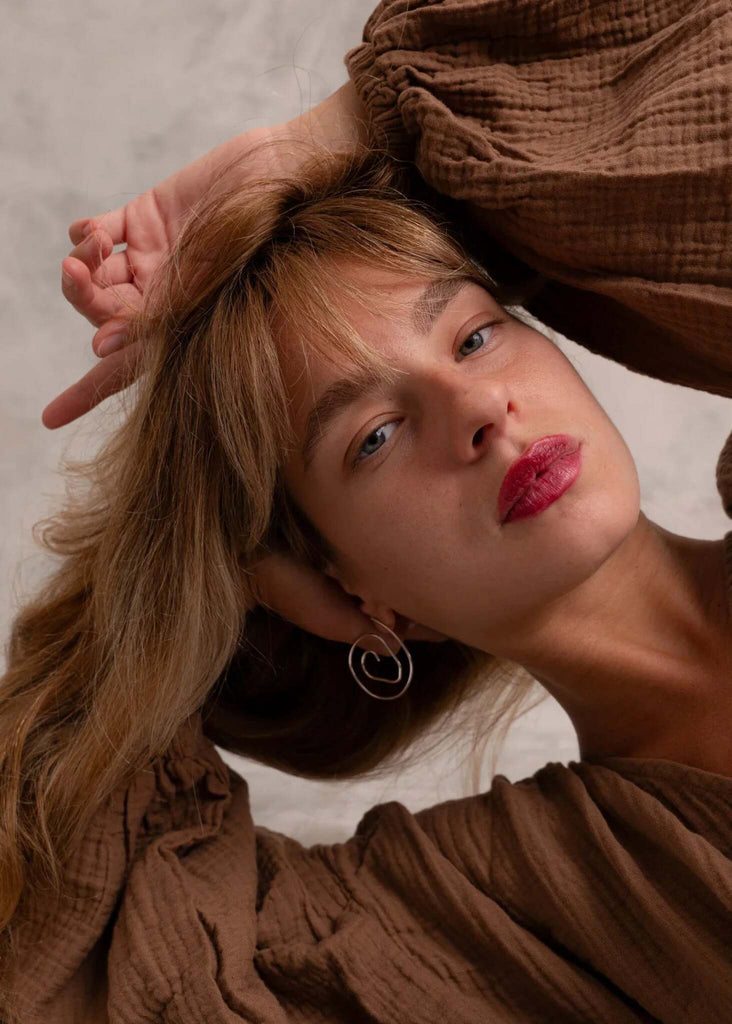 Atalanta Earrings — Silver heart earrings on model — MYFASHIONFRUIT