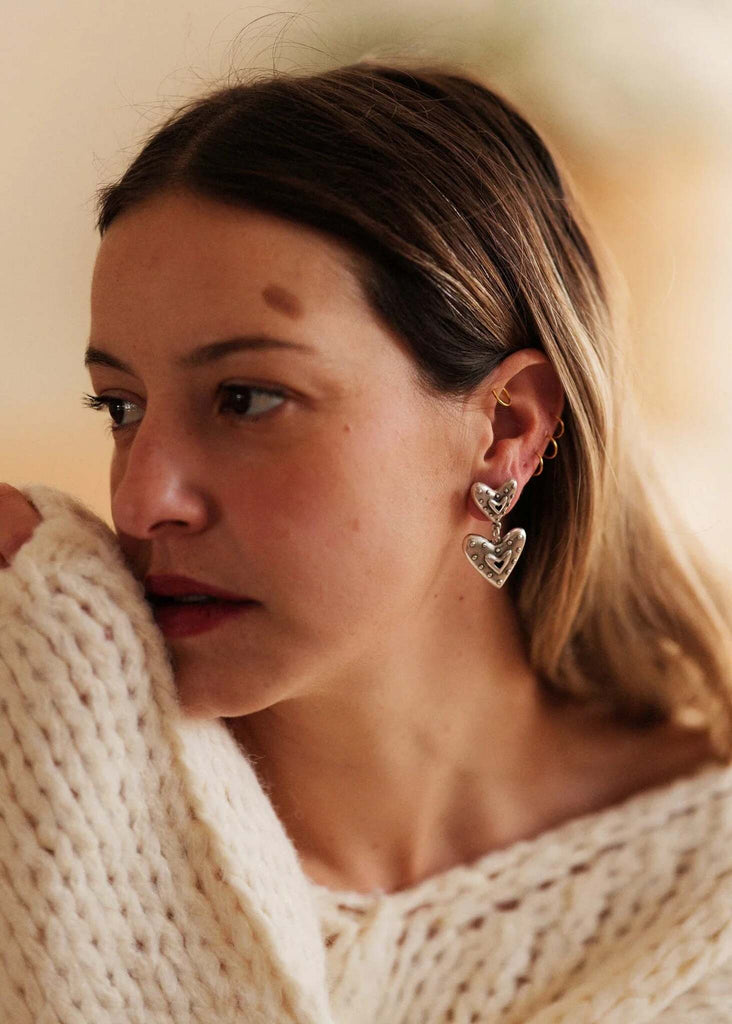 Amora Earrings — Silver heart earrings on model — MYFASHIONFRUIT
