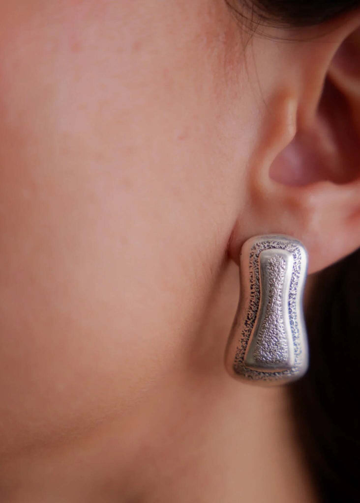 Minerva Earrings — Silver earrings on model, detail — MYFASHIONFRUIT