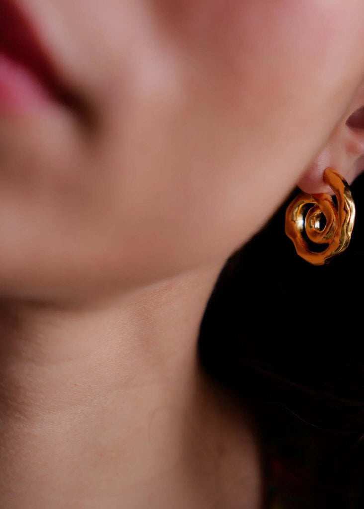 Aina Hoops — Gold swirl hoops on model, detail — MYFASHIONFRUIT
