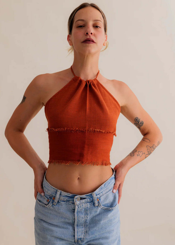 Amaya Top — Rust halter neck top with frayed edges on model — MYFASHIONFRUIT