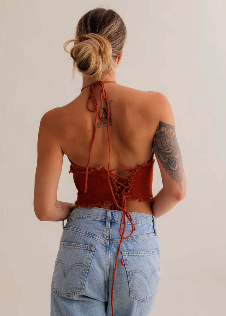 Amaya Top — Rust halter top with lace-up back on model — MYFASHIONFRUIT