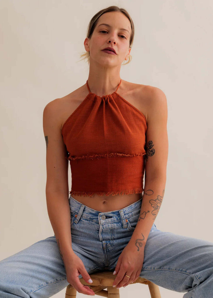 Amaya Top — Rust orange halter top on a model — MYFASHIONFRUIT