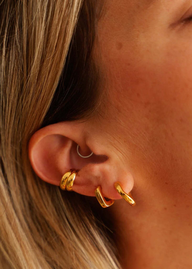 Fortune Ear Cuffs — Three gold hoops on ear, detail — MYFASHIONFRUIT