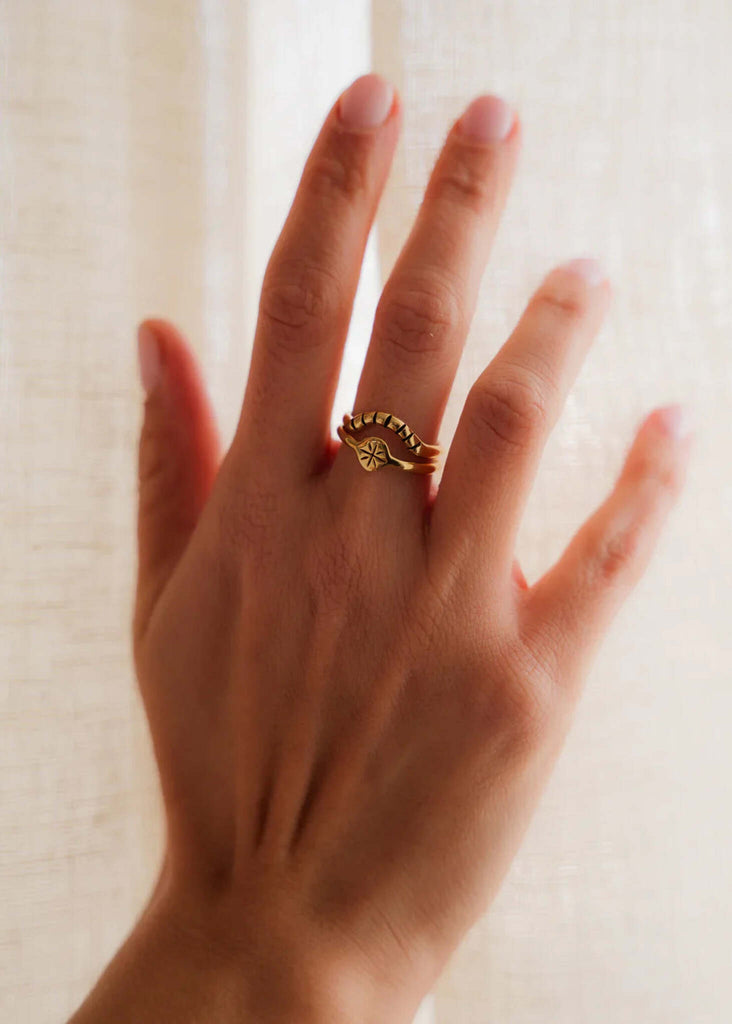 Stellar Ring — Gold rings on hand, detail — MYFASHIONFRUIT