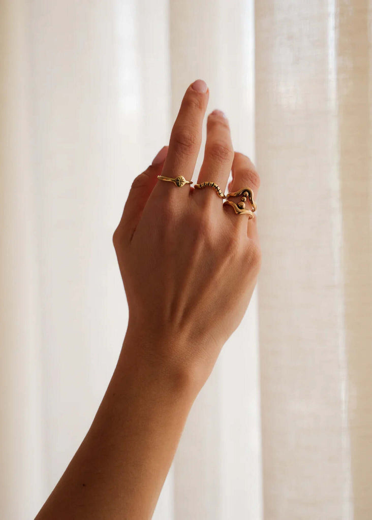 Stellar Ring — gold rings on hand, detail — MYFASHIONFRUIT
