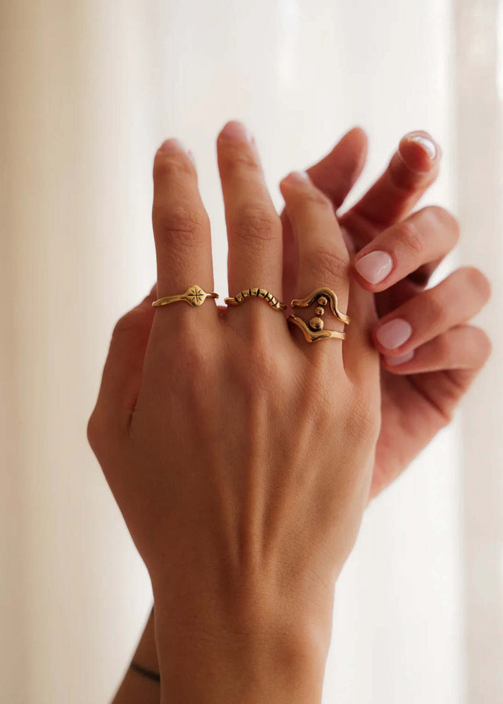Apollo Ring — Gold rings on fingers, detail — MYFASHIONFRUIT