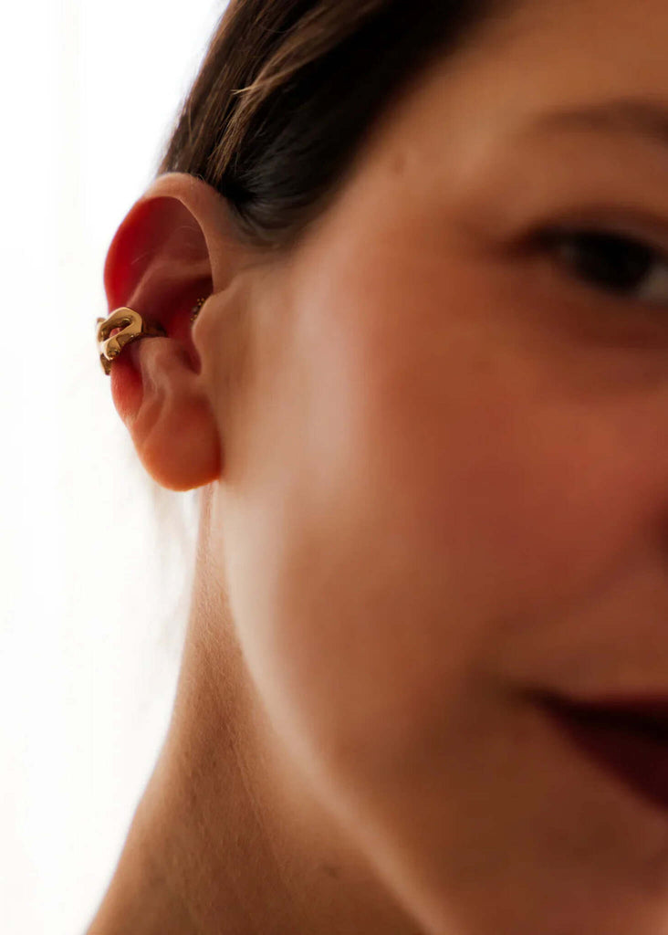 Tara Minimal Ear Cuff — Gold ear cuff on model, detail — MYFASHIONFRUIT