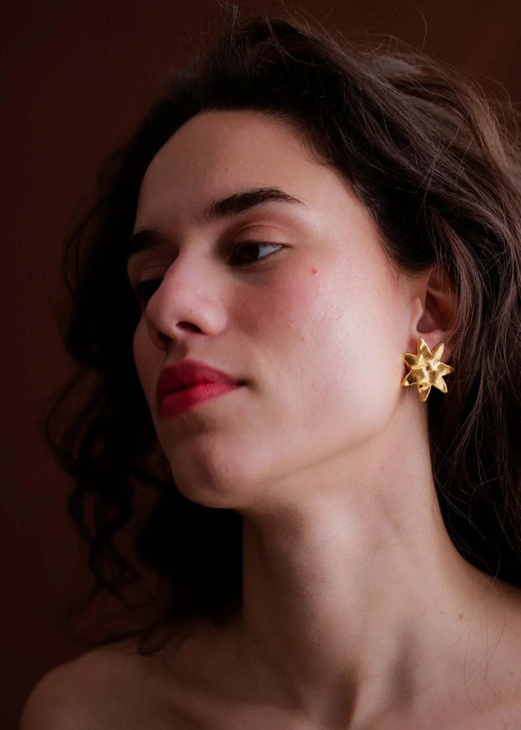 Raisa Earrings — Gold textured star on model — MYFASHIONFRUIT
