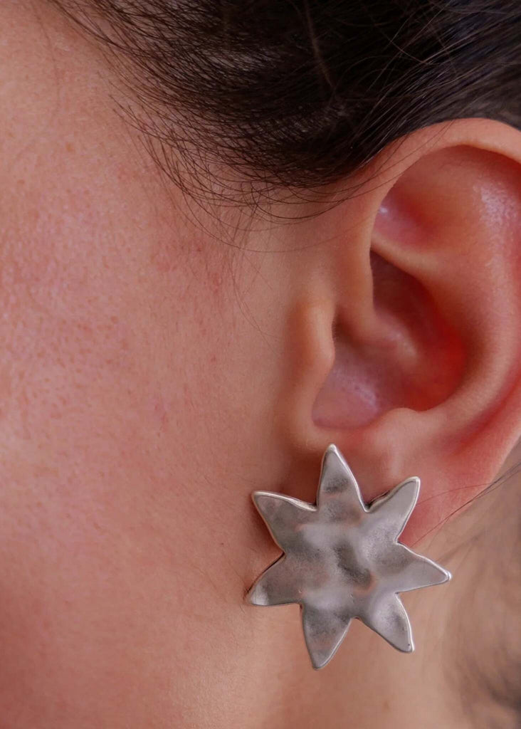 Raisa Earrings — Silver star earring on model, detail — MYFASHIONFRUIT