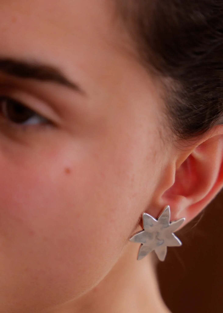 Raisa Earrings — silver star earring on model, detail — MYFASHIONFRUIT
