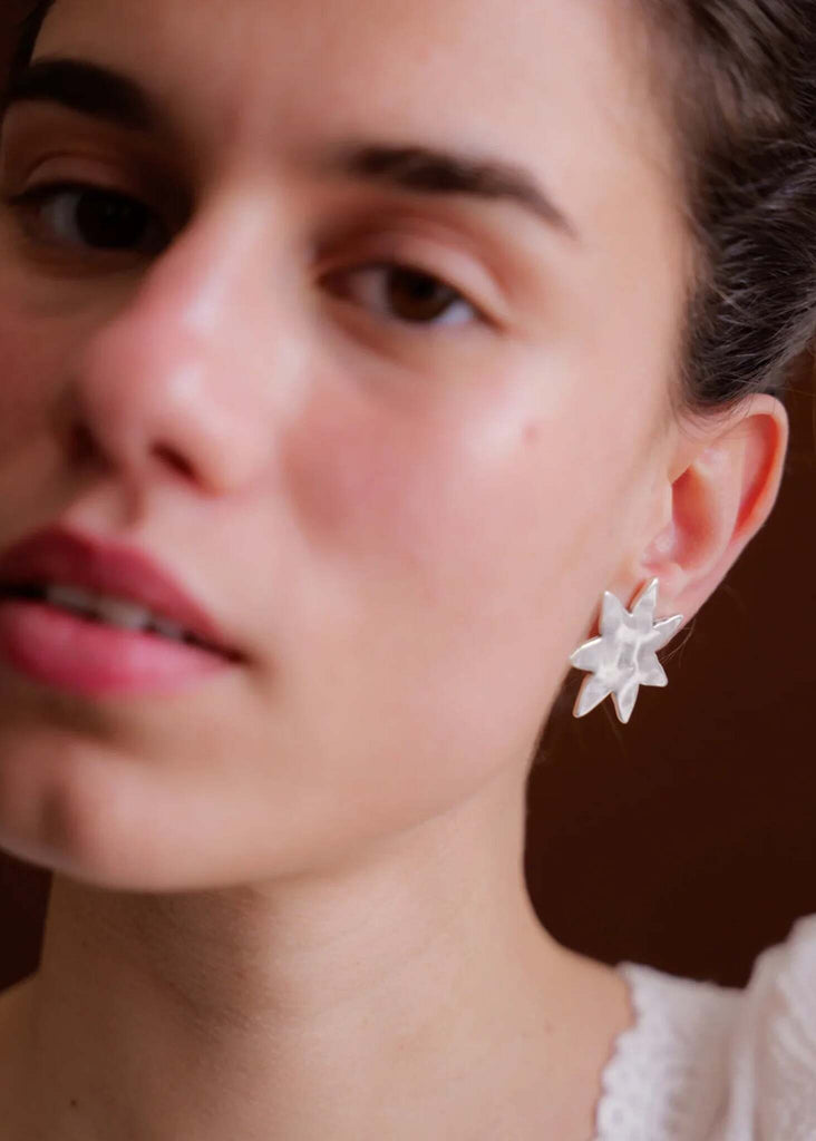Raisa Earrings — Silver star on model — MYFASHIONFRUIT