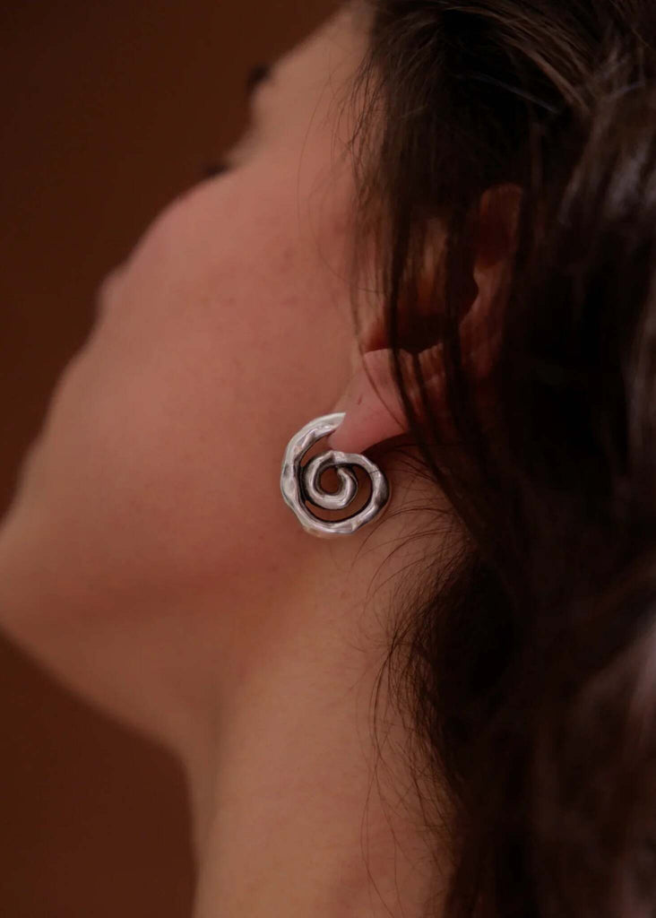 Aina Hoops — Silver spiral earrings on model, detail — MYFASHIONFRUIT