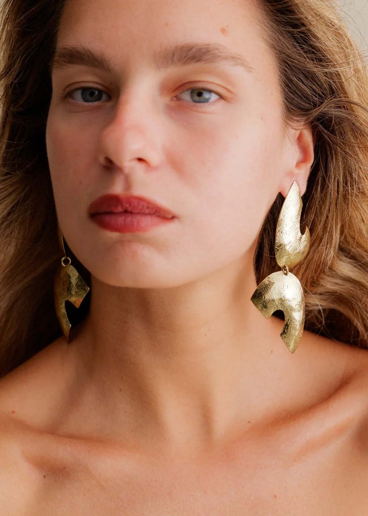 Riri Earrings — Gold statement earrings on model — MYFASHIONFRUIT