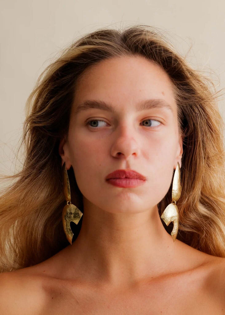 Riri Earrings — Gold hammered metal earrings on model — MYFASHIONFRUIT