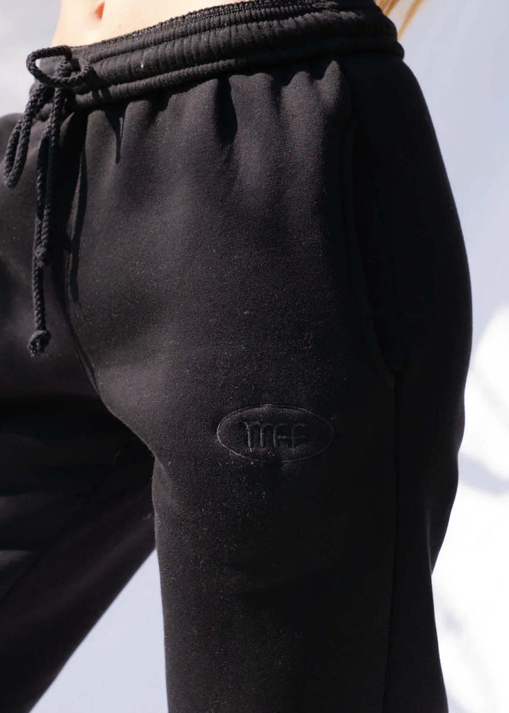 Mff Unisex Sweatpants — Black sweatpants on model, detail — MYFASHIONFRUIT