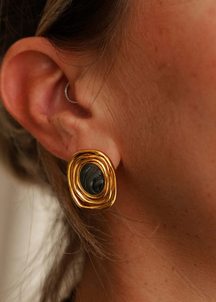 Milcah Earrings — Gold swirl earrings on model, detail — MYFASHIONFRUIT