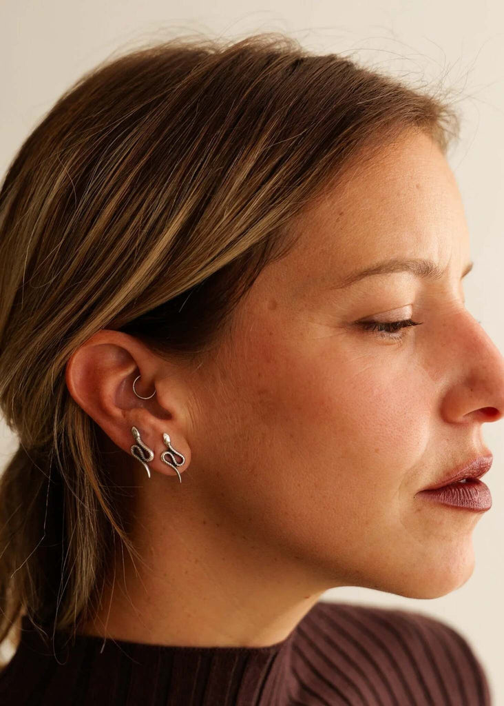 Nagini Earrings — Silver snake earrings on model — MYFASHIONFRUIT