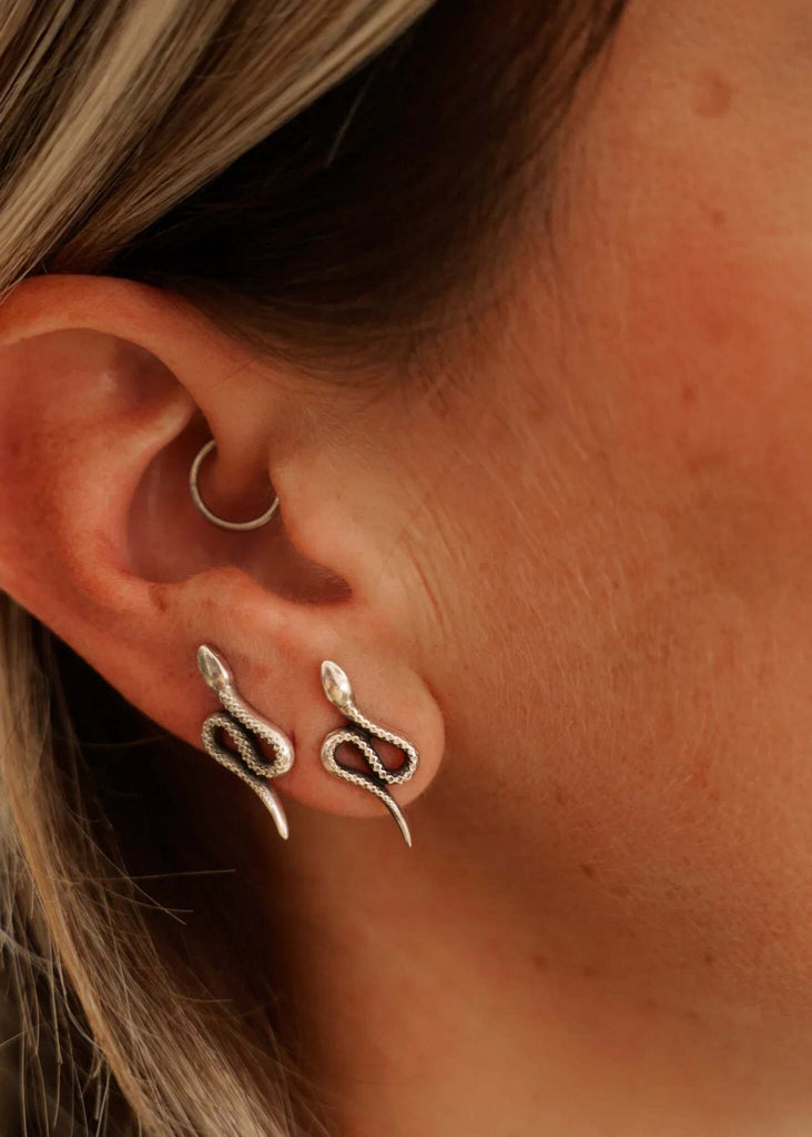 Nagini Earrings — Silver snake studs, detail on model — MYFASHIONFRUIT