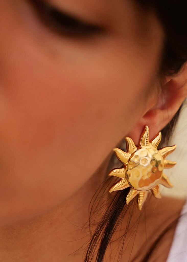 Olena Earrings — Gold sunburst earrings on model, detail — MYFASHIONFRUIT