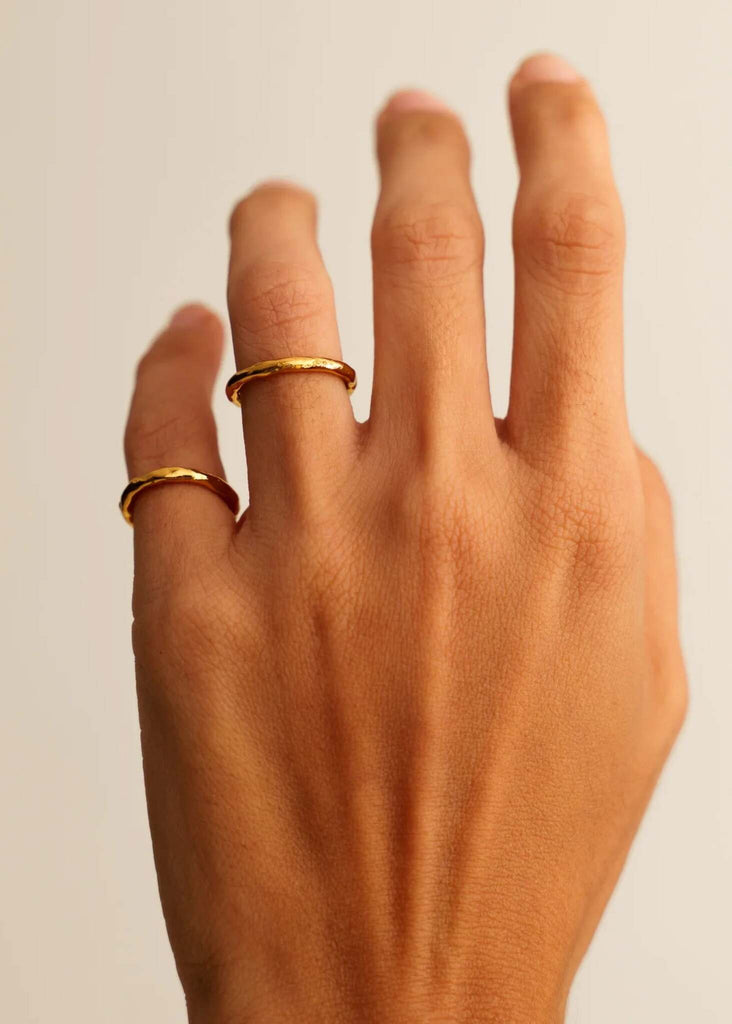 Bebe Set of 2 Rings — Gold rings on hand, detail — MYFASHIONFRUIT