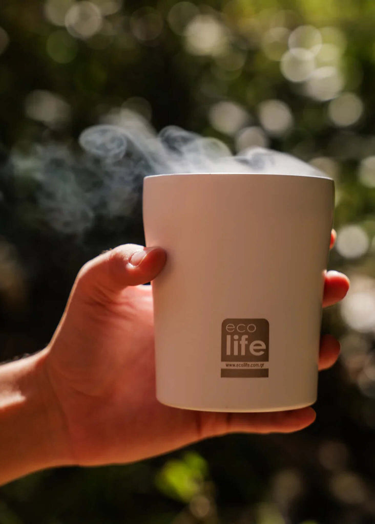 Ecolife White Coffee Thermos — Hand holding mug w/logo, steam — MYFASHIONFRUIT