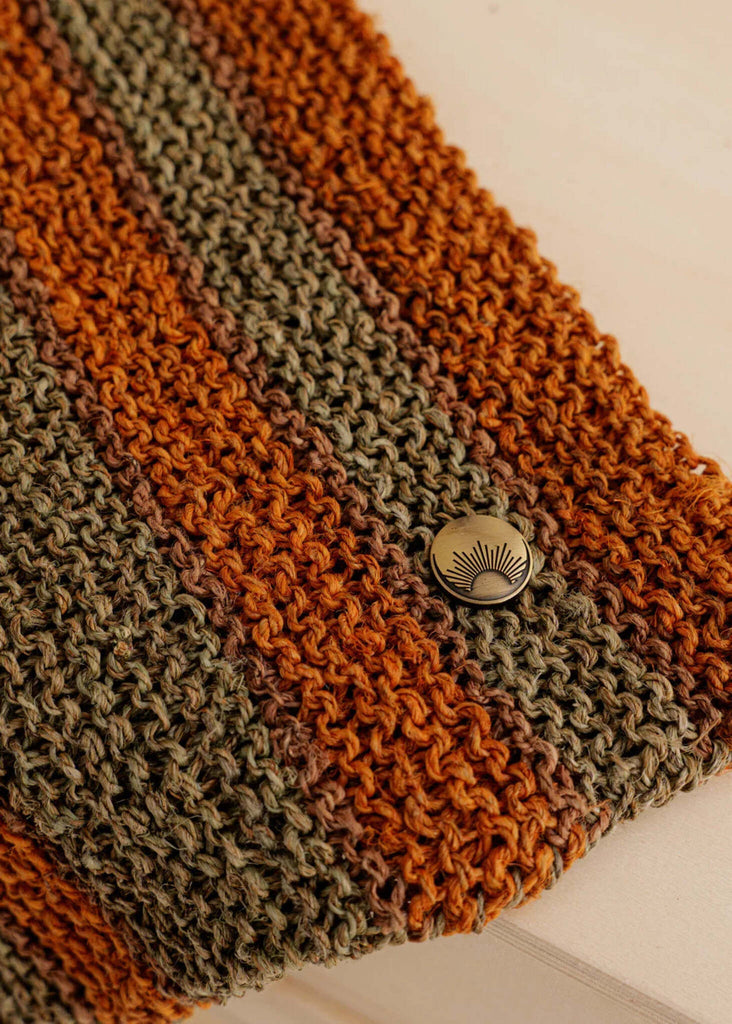 Crochet Striped Bag — detail, orange and green stripes, logo button — MYFASHIONFRUIT
