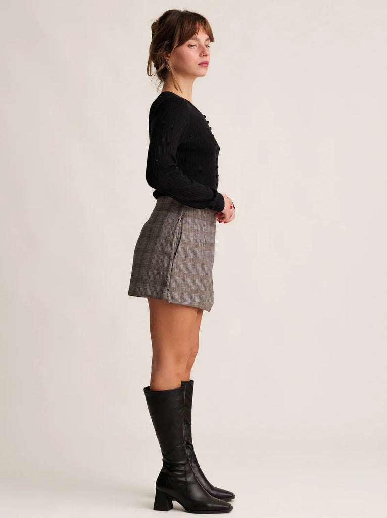 Martina Skort — Plaid skort on model with black top and boots — MYFASHIONFRUIT