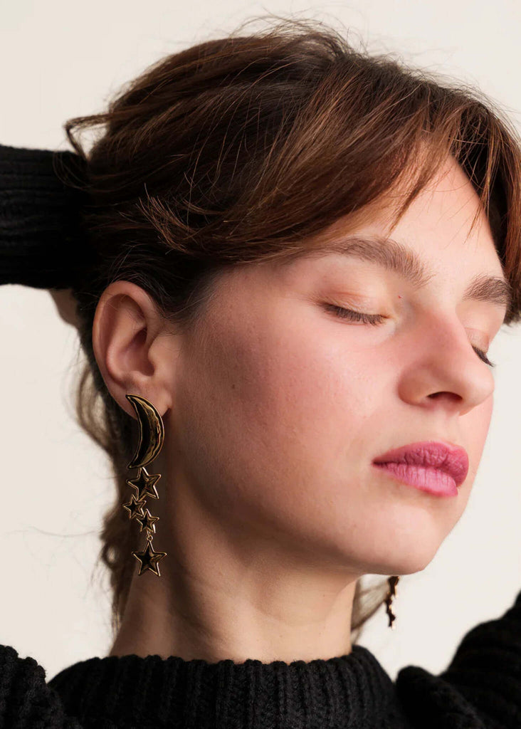 Cosmic Earrings — Gold crescent moon, stars on model — MYFASHIONFRUIT