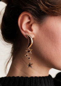 Cosmic Earrings — Gold moon & star earrings on model detail — MYFASHIONFRUIT