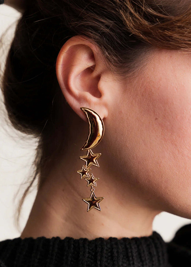 Cosmic Earrings — Gold moon & star earrings on model detail — MYFASHIONFRUIT