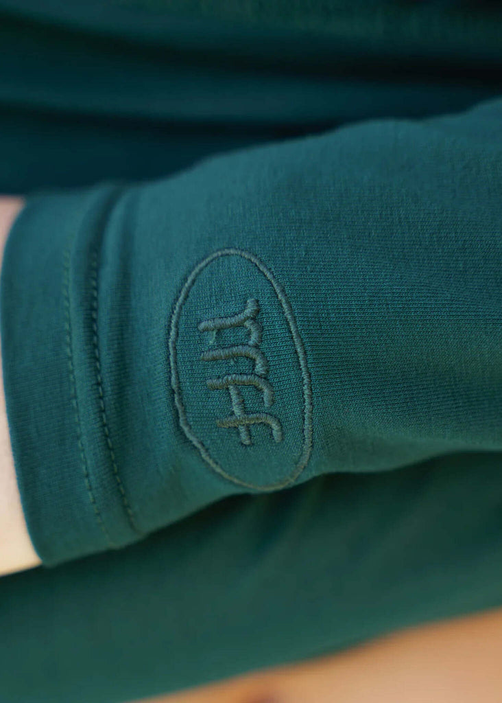 Lullaby Cardi — Sleeve detail, MFF logo, green — MYFASHIONFRUIT