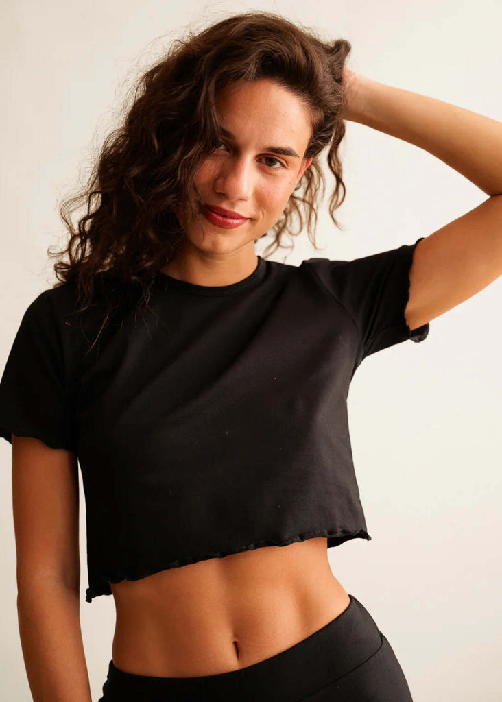 Rachel Baby Tee — Black crop top with lettuce hem, on model — MYFASHIONFRUIT
