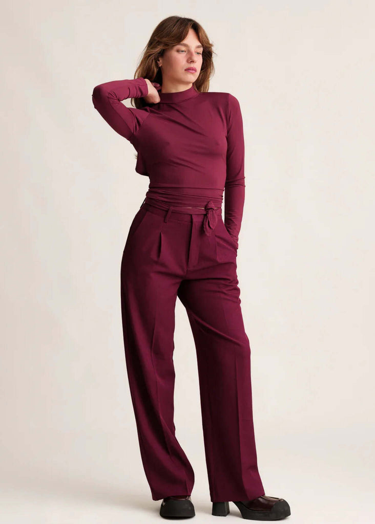 Michelle Trousers — Wide leg burgundy pants on model — MYFASHIONFRUIT