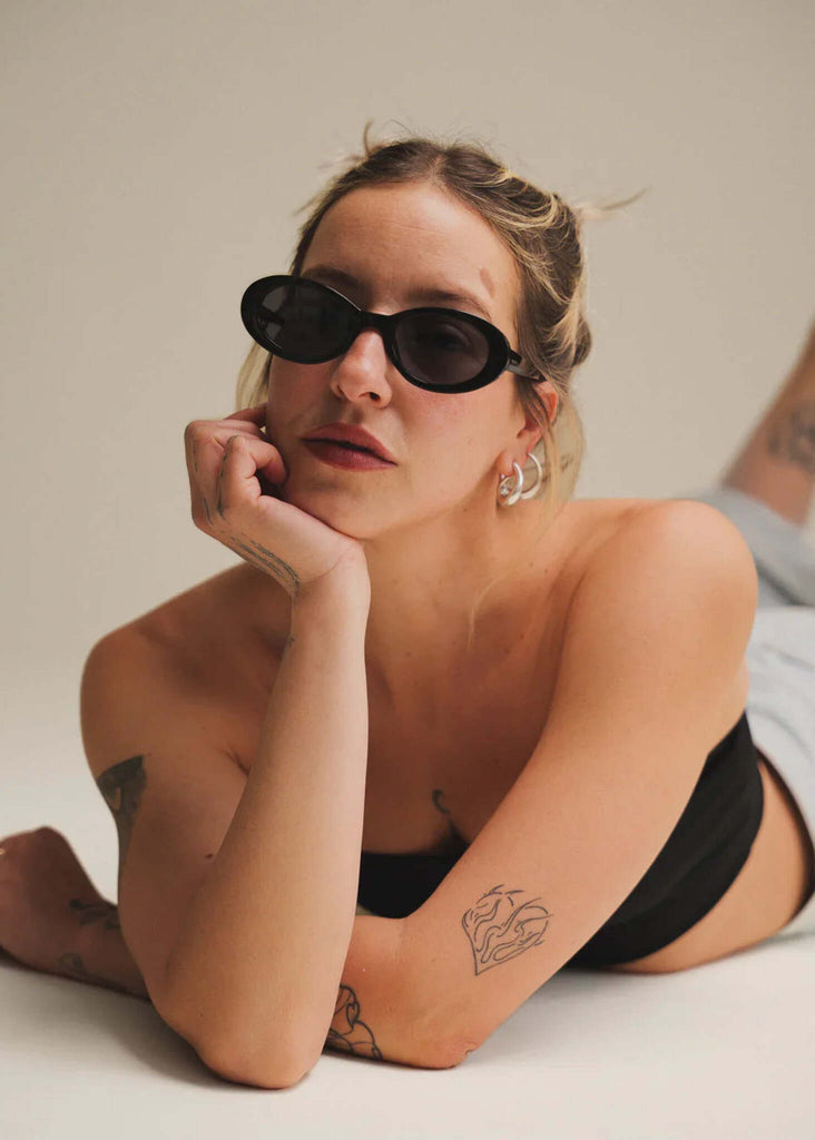 Komono ANA Black Sunglasses — on model, oval black frame — MYFASHIONFRUIT