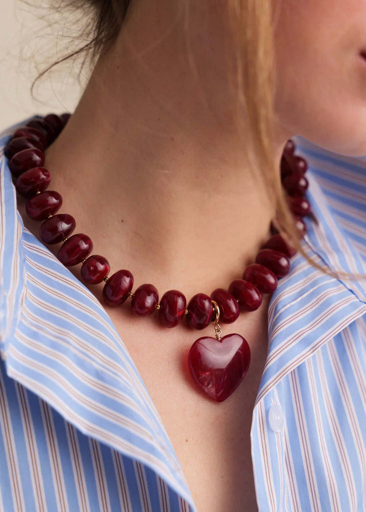 Moyo Necklace — Burgundy beads and heart pendant on model — MYFASHIONFRUIT