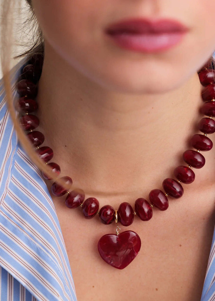 Moyo Necklace — Red beaded heart necklace on model, detail — MYFASHIONFRUIT