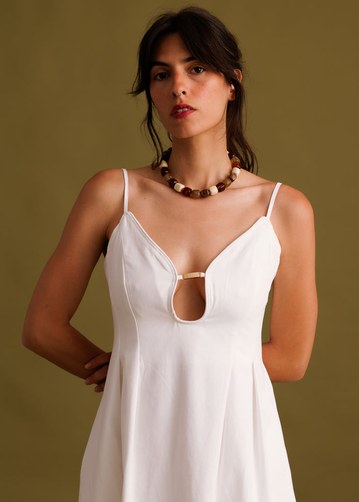 Erin Dress — White dress with cutout detail on model — MYFASHIONFRUIT