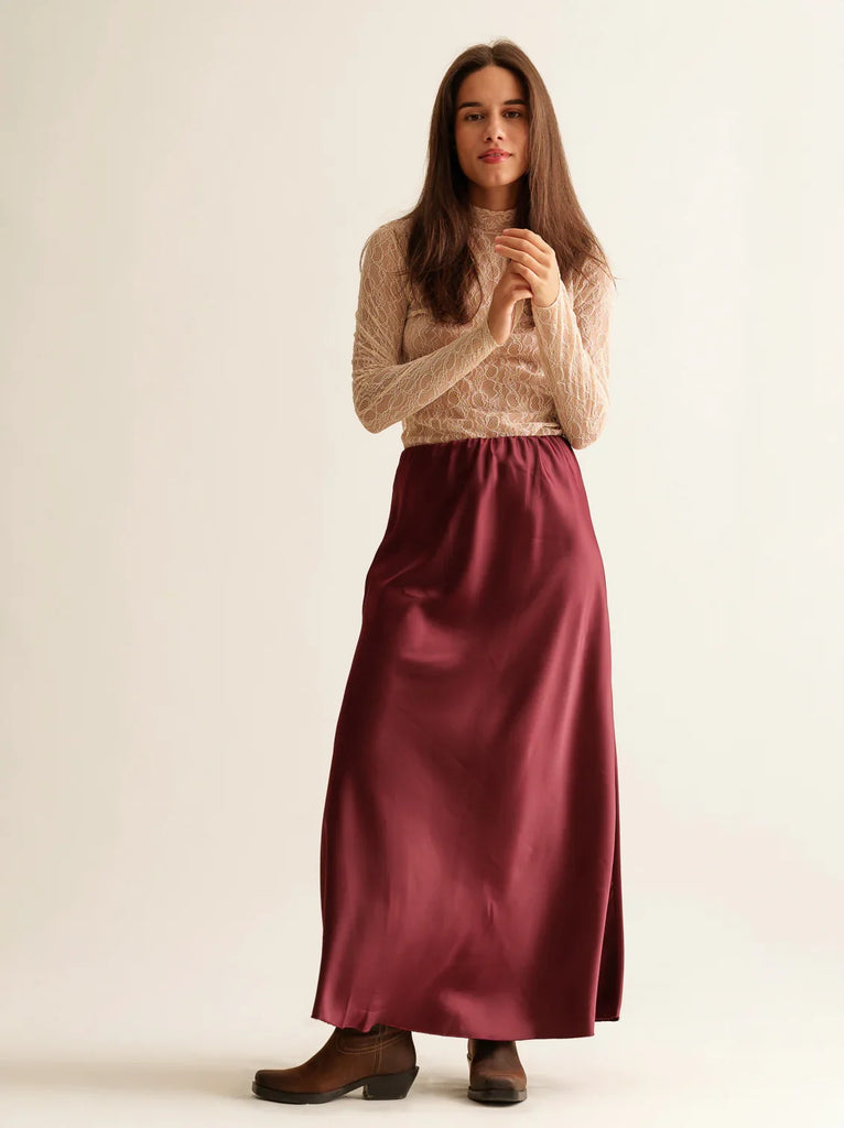 Keena Skirt — Burgundy satin skirt on model — MYFASHIONFRUIT