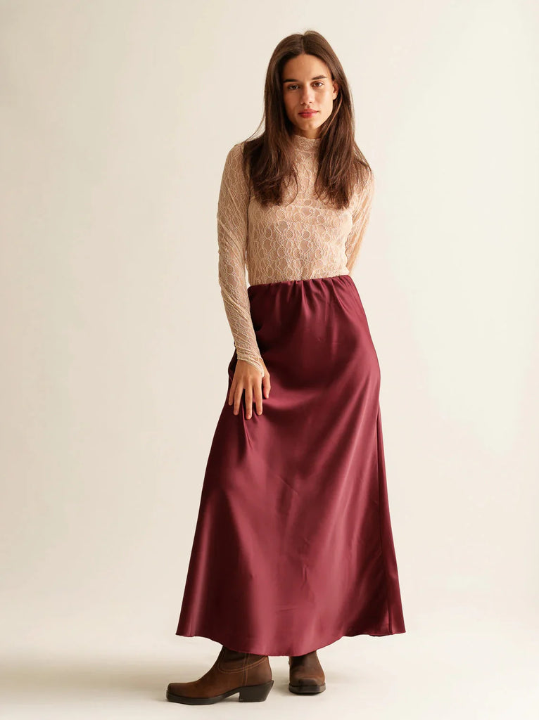 Keena Skirt — burgundy satin skirt on model — MYFASHIONFRUIT